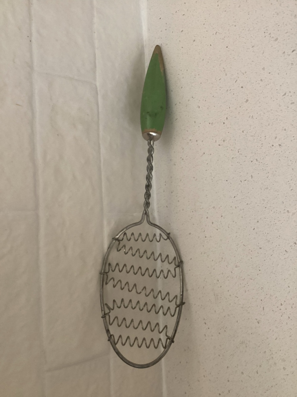 Vtg. Coiled Wire Spoon Whisk dating back to the 1030s with a painted green wood